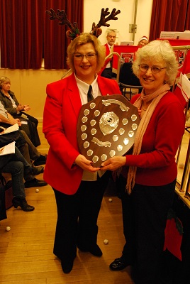 Picture of Helen receiving shield
